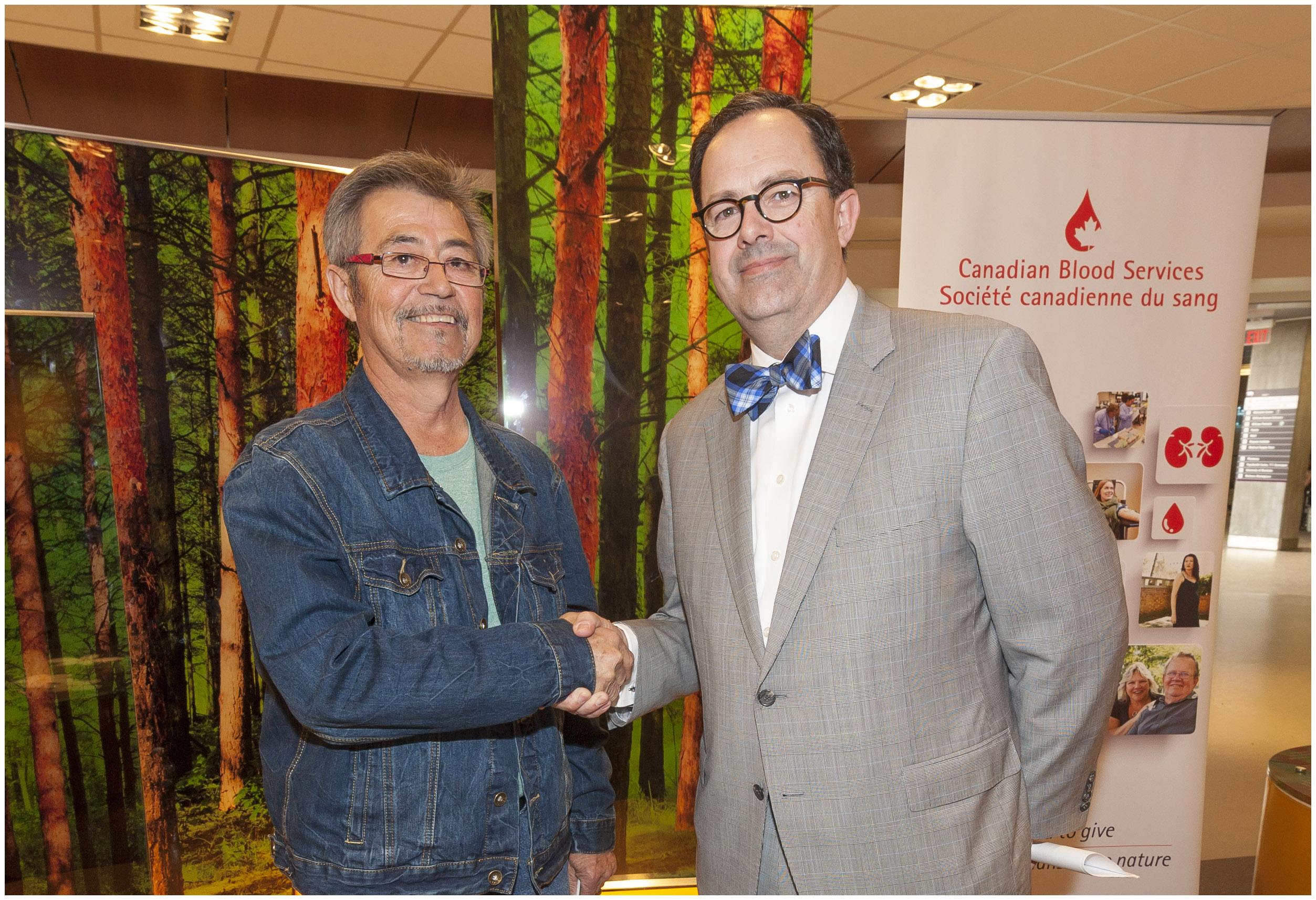 Arnold Dysart (left) pictured with Dr. Peter Nickerson (right), Medical Advisor, Organ Donation and Transplantation Division, Canadian Blood Services. Arnold received his kidney in 2014