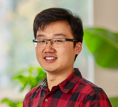 Andy An, male with glasses and red checkered shirt