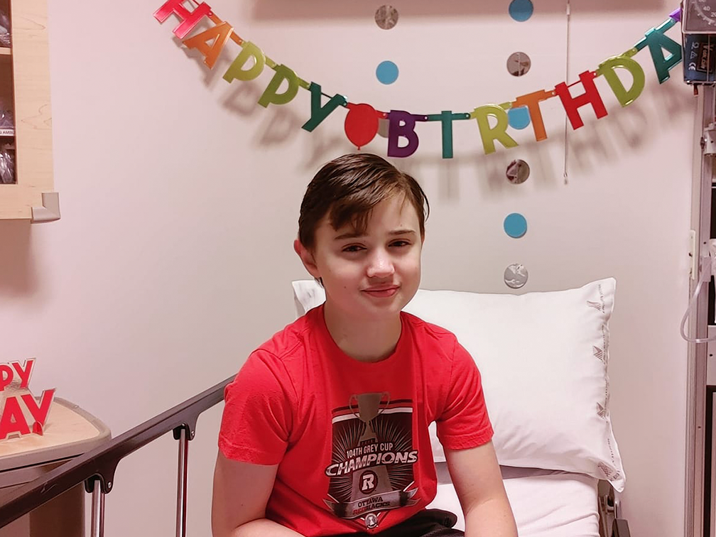 A young cancer patient celebrates his birthday during treatment