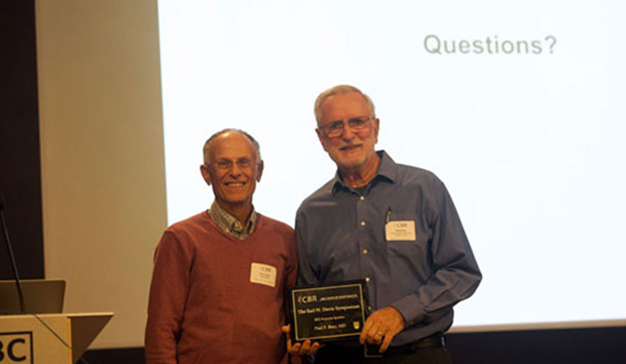 Dr. Paul Bray (right) with Dr. Edward Conway holding an award