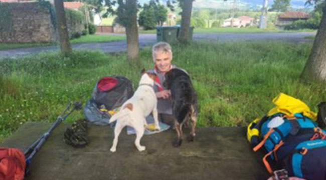 Dr. John Blake with dogs outdoors