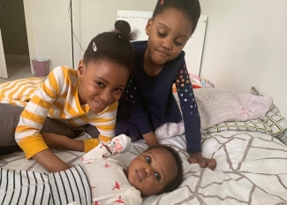 Red blood cells recipient Aaliyah Mchopanga with her sisters Naila and Mya