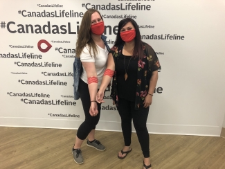 Registered nurse Jenn Brenneis, left, and Chelsea Bates, right, celebrate after donating.