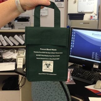 Green Prevent Blood Waste Bag for Platelet transport with the Biohazard icon